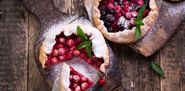 stock-photo-blueberry-cherry-raspberry-and-blackcurrant-galette-on-wooden-background-4689939562-2
